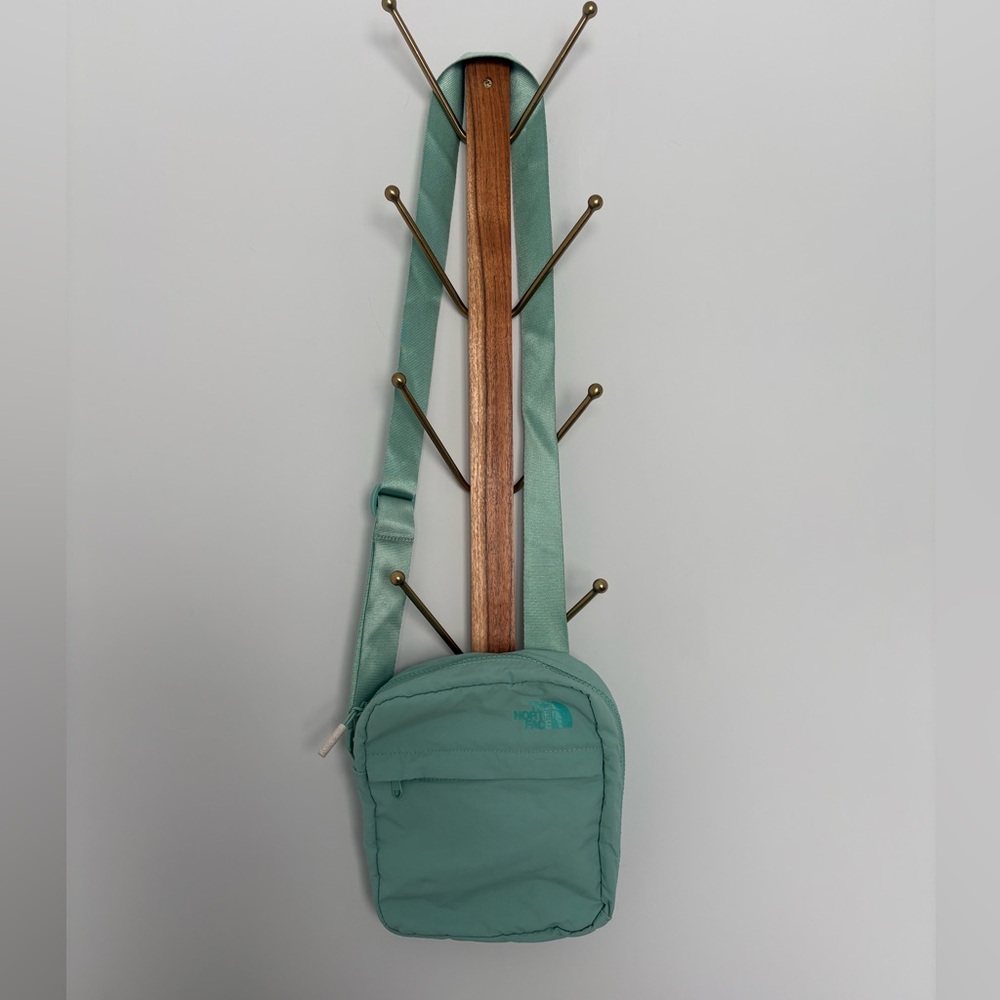 The NorthFace teal shoulder bag